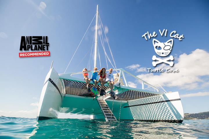 People sit on a catamaran with 'The VI Cat' logo and 'Animal Planet Recommended' text.